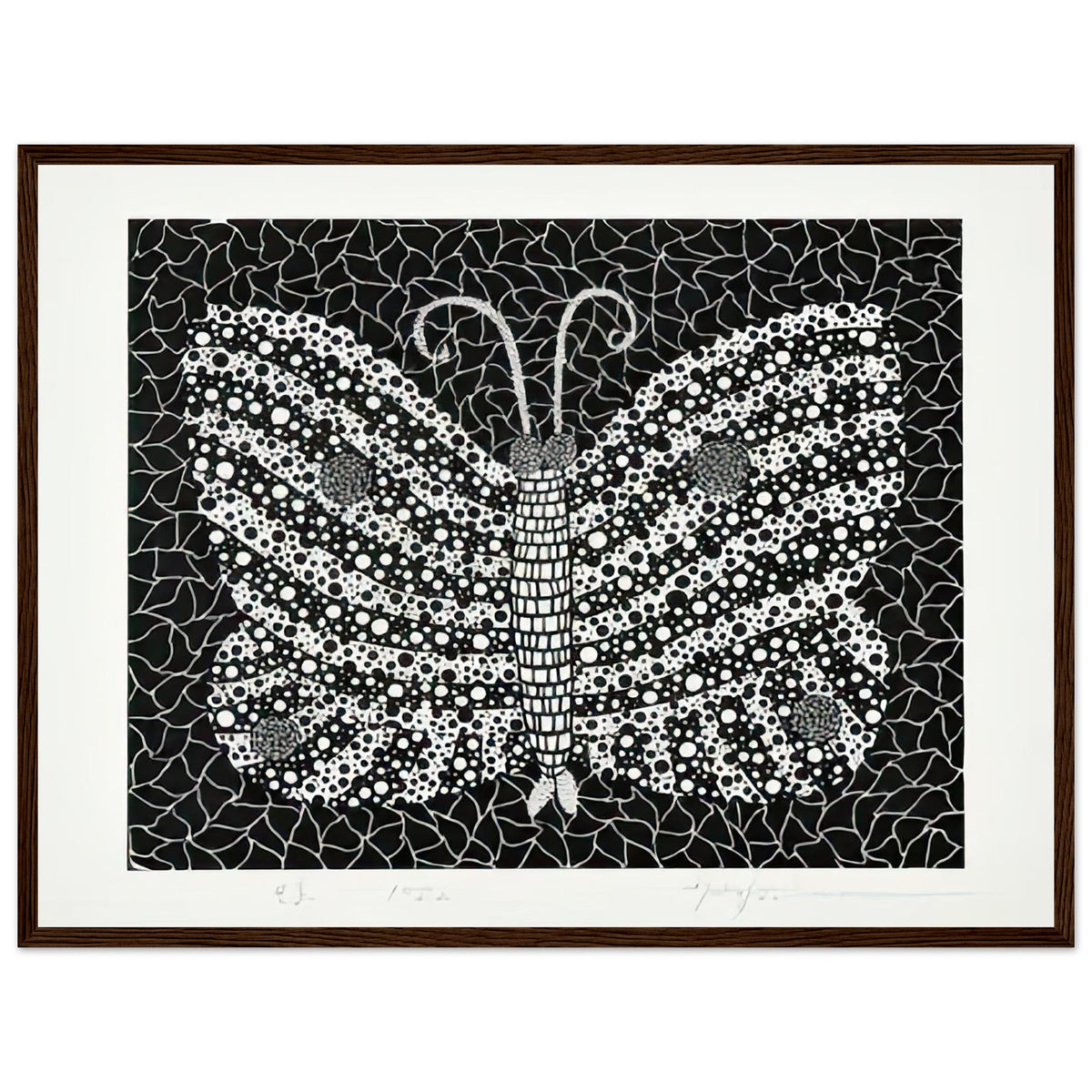 Yayoi Kusama framed print — Butterfly [Kusama 18] by Yayoi Kusama takes the lightness of a butterfly and gives it graphic intensity through pattern, dark wood frame, 45x60 cm / 18x24″